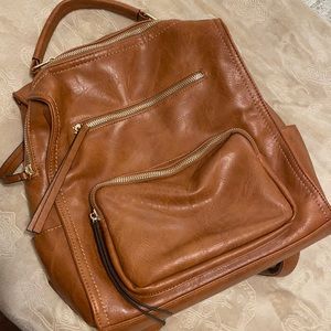 Brown leather backpack / baby bag